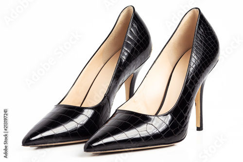 Slika na platnu Black high heel shoes isolated on a white background.