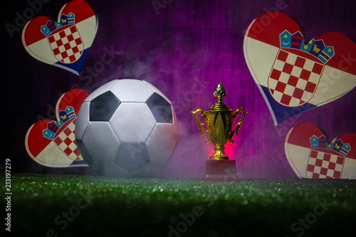 Croatia flag, golden champion’s cup and soccer ball.Concept sport. photo