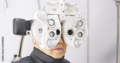 Senior man doing eye test