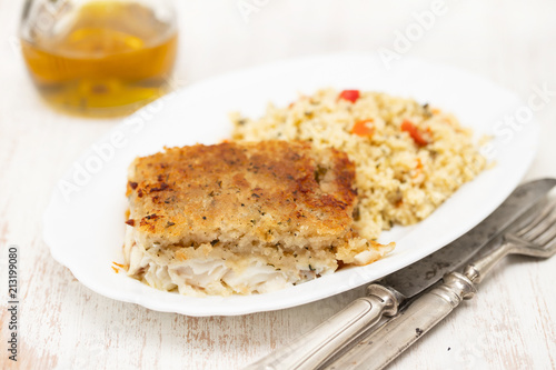 fried fish with garnish on dish