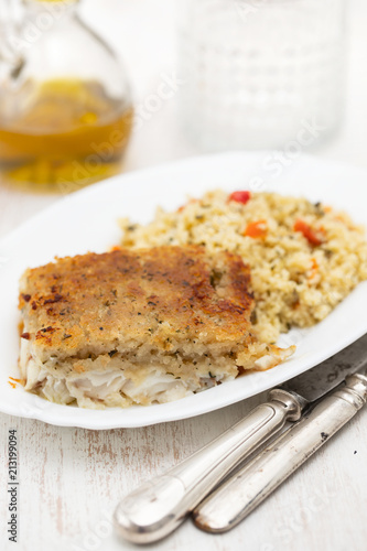 fried fish with garnish on dish