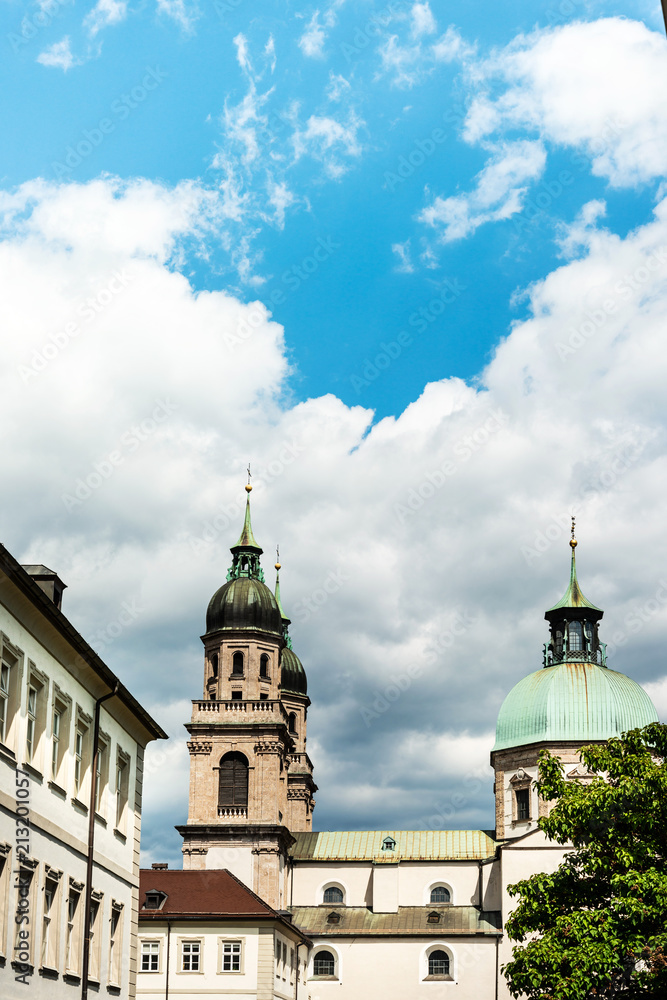 Fototapeta premium The city tower is an enclosed one in the row of houses Innsbruck, Austria