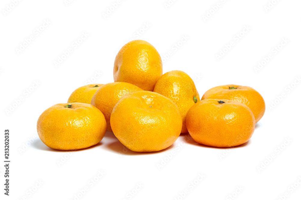 Heap tangerine or mandarin citrus fruit isolated on white background Heap tangerine or mandarin citrus fruit isolated on white background