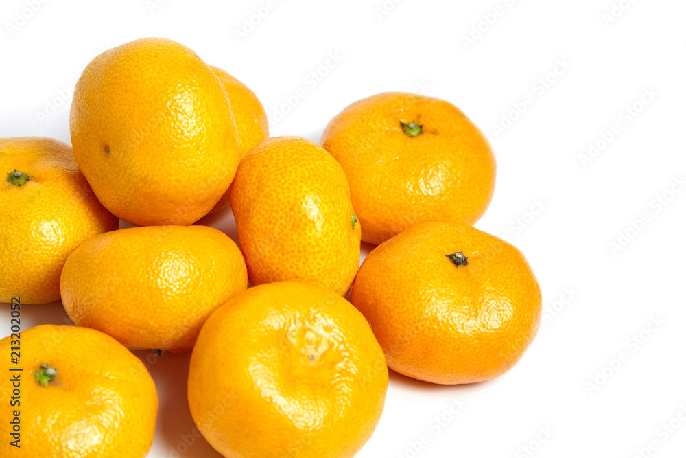 Heap tangerine or mandarin citrus fruit isolated on white background Heap tangerine or mandarin citrus fruit isolated on white background