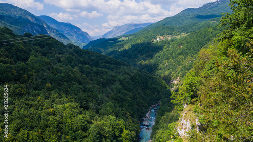View on Tara river canyon in a cloudy day  mountains around  Montenegro  Dzurdzevica Bridge