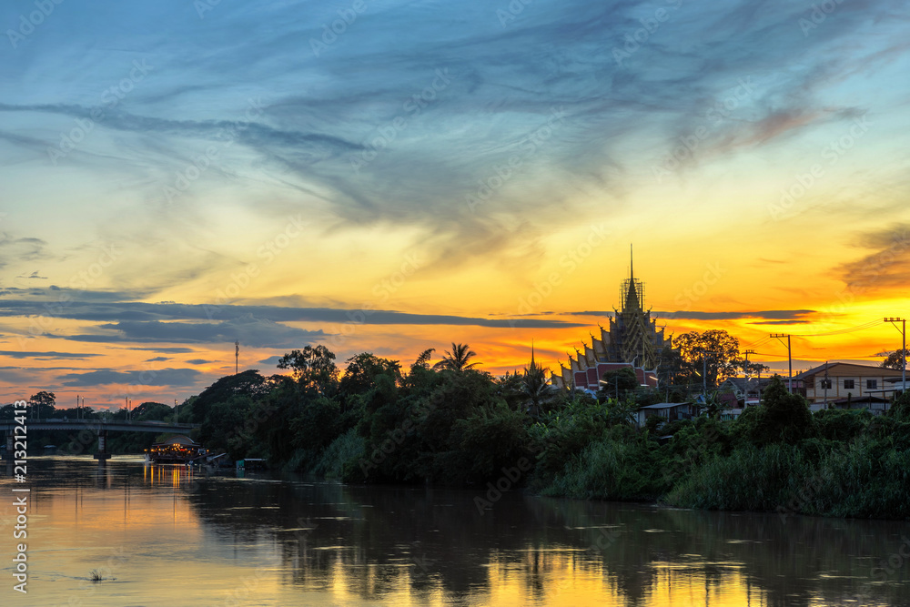 Natural evening at Raft Village in Temple (Thai language:Wat Chan West) is a Buddhist temple (Thai language:Wat) It is a major tourist attraction Phitsanulok, Thailand. Natural evening at Raft Village in Temple (Thai language:Wat Chan West) is a Buddhist temple (Thai language:Wat) It is a major tourist attraction Phitsanulok, Thailand.