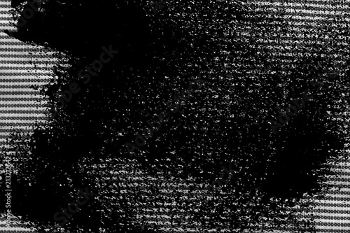 Grunge Black and white closeup of stripped fabric texture.