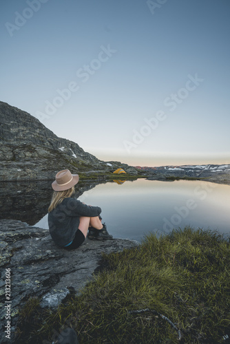 Girl overlooking mountain c...