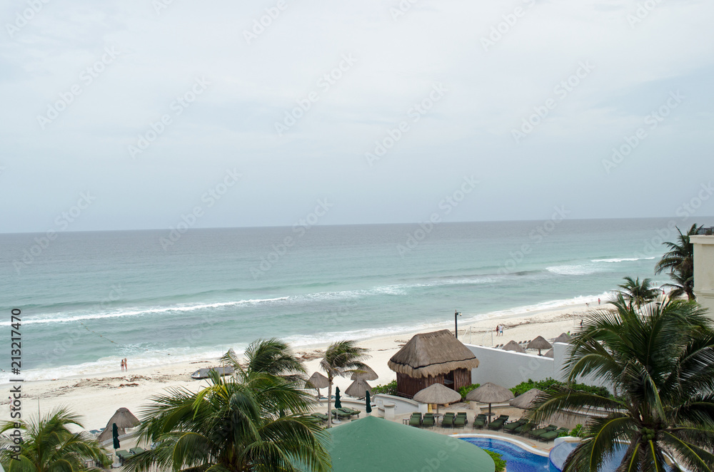 Fototapeta premium Carrabian sea beach with hut coconut trees