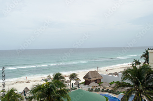 Carrabian sea beach with hut coconut trees