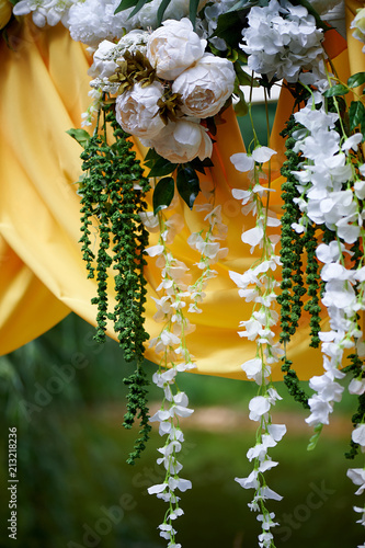 Wallpaper Mural Arch for wedding ceremony in the open air, decorated with yellow fabric and flowers.Details close Torontodigital.ca
