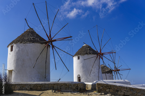 Mykonos, Greece traditional white windmills without crowd. Day view of windmills, the islands landmark, at Aleykantra - Little Venice area.