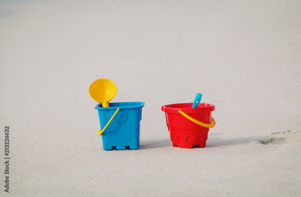 kid toys on tropical sand beach kid toys on tropical sand beach