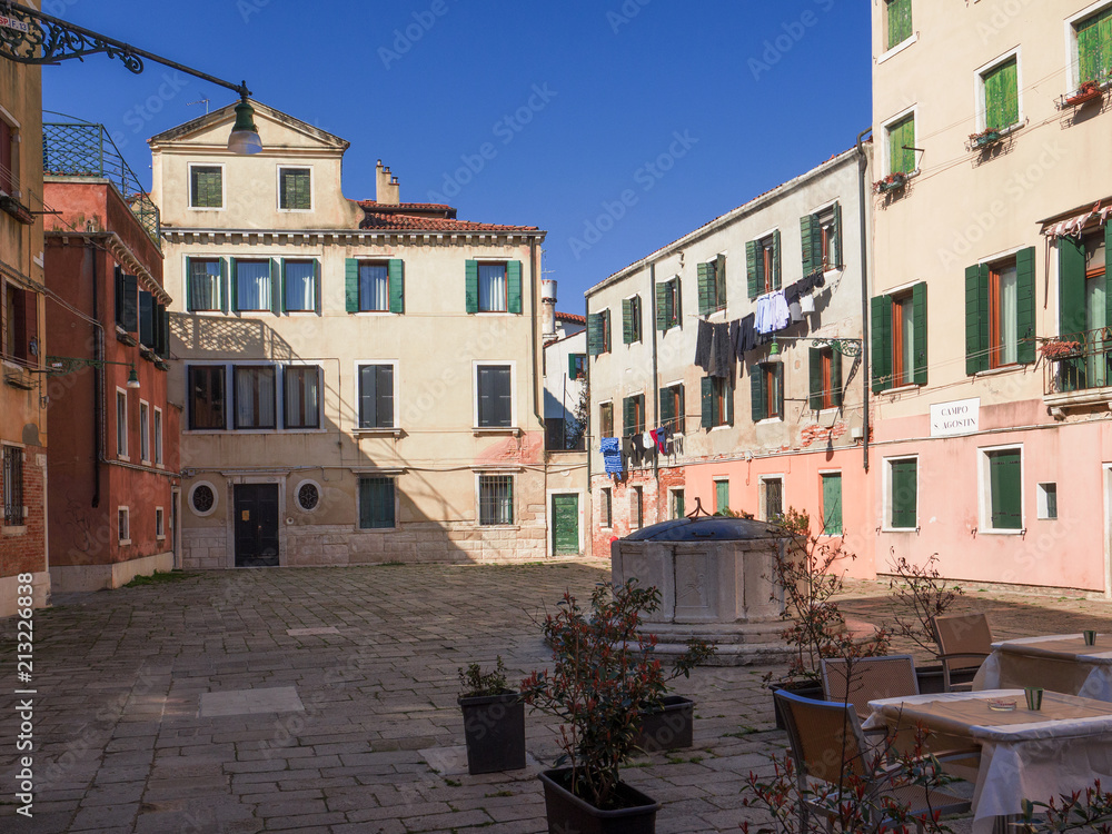 coffee tables in a characteristic Venetian square, Italy