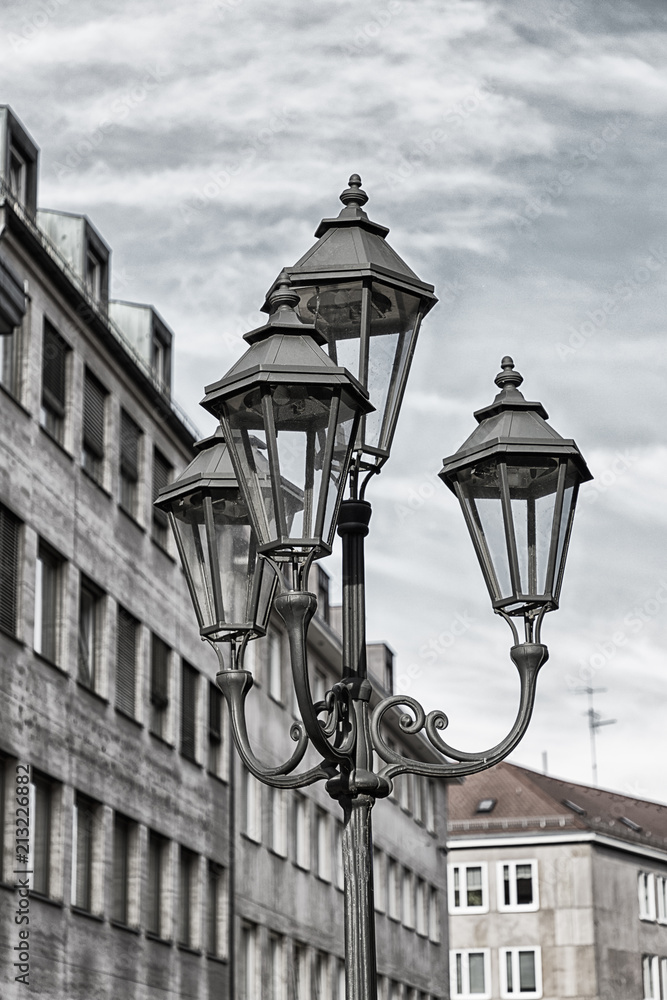 Vintage lantern in the street. Details. Nuremberg, Bavaria, Germany. Black and white photo