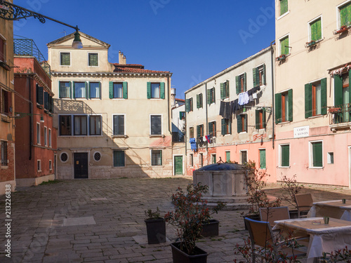 coffee tables in a characteristic Venetian square, Italy © gpriccardi