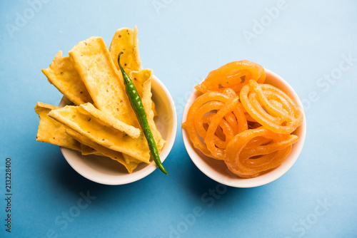 Crispy Fafda with sweet jalebi is an Indian snack most popular in Gujarat, selective focus
