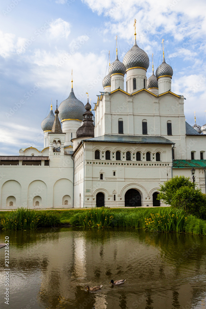 Reflection of the Orthodox Cathedral of the Rostov Kremlin in the pond of the courtyard