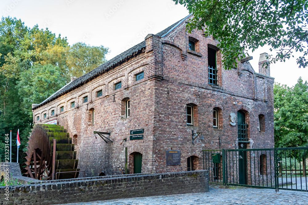 Old water mill ' Wymarsche Watermolen' in Arcen, Netherlands