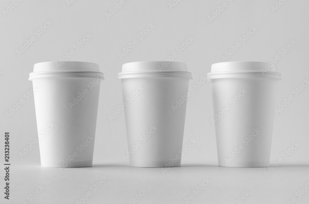12 oz. white coffee paper cup mock-up with lid. 12 oz. white coffee paper cup mock-up with lid.