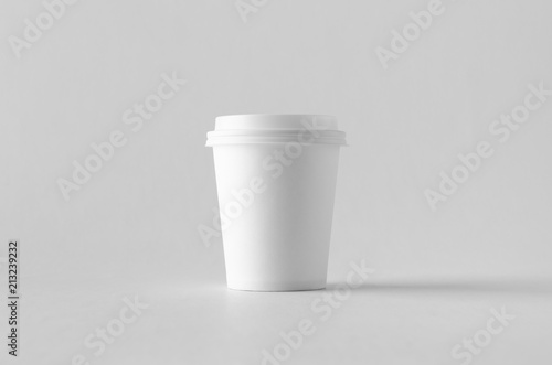 Konstfotografi 8 oz. white coffee paper cup mock-up with lid.