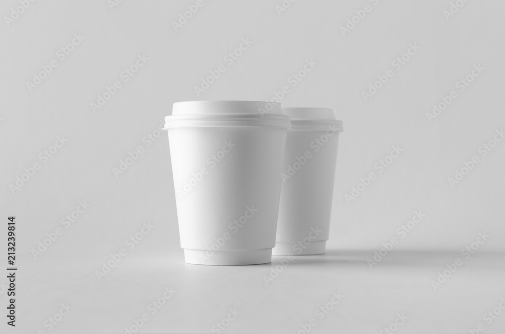 8 oz. white double wall coffee paper cup mock-up with lid. 8 oz. white double wall coffee paper cup mock-up with lid.