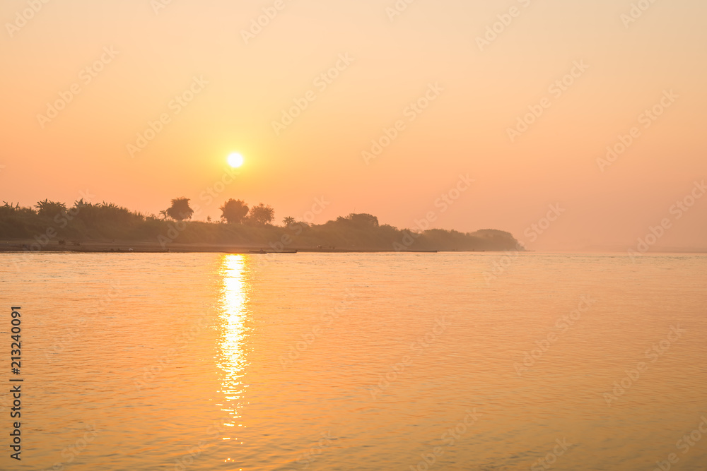 Naklejka premium sunrise at the Mekong River landscape