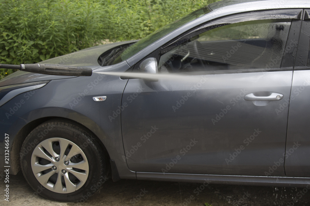 Car washing. Cleaning Car Using High Pressure Water Car washing. Cleaning Car Using High Pressure Water
