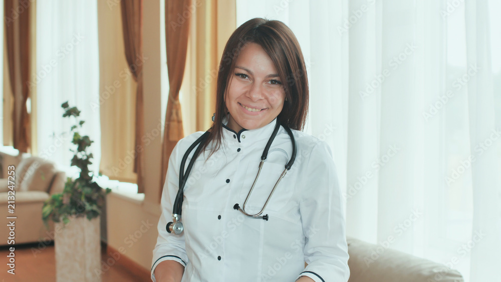 Portrait of a young female doctor in a good mood. Portrait of a young female doctor in a good mood.