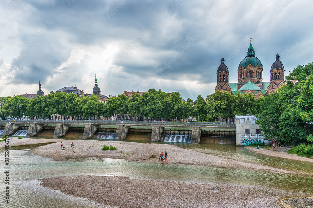 Naklejka premium Munich, Germany June 09, 2018: St. Luke Church near Isar river and Wehrsteg, Munich, Germany