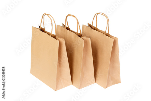 Brown recycled paper shopping bag isolated on white background
