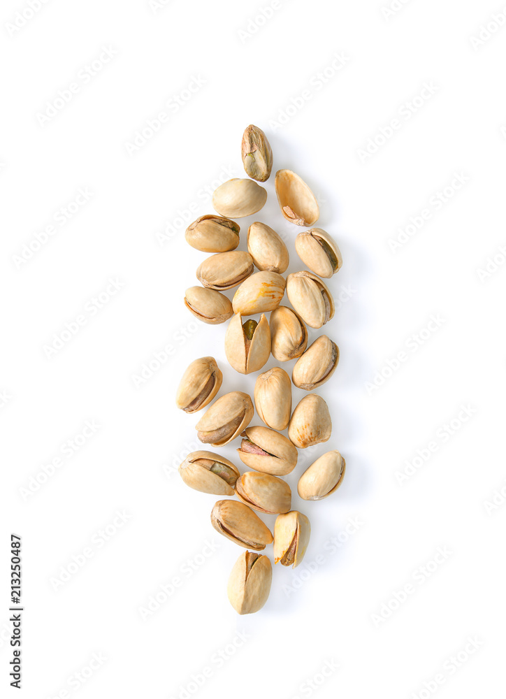 Pistachios isolated on white background, top view. Pistachios isolated on white background, top view.