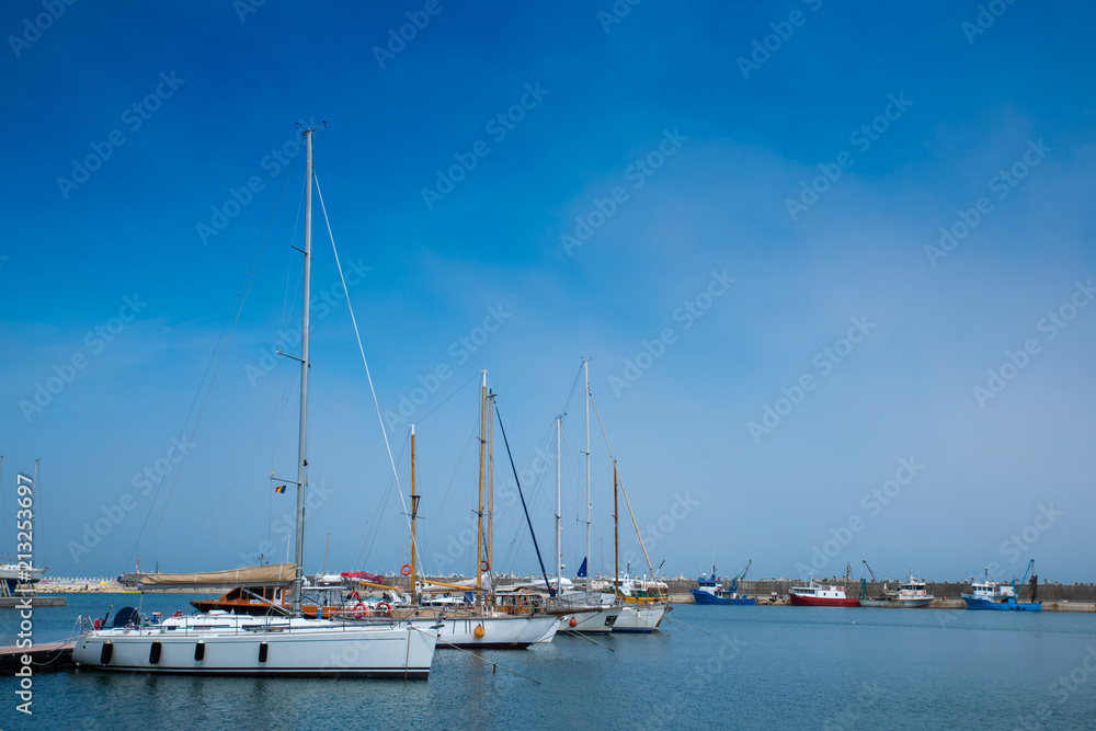 Anchored yachts near the pier