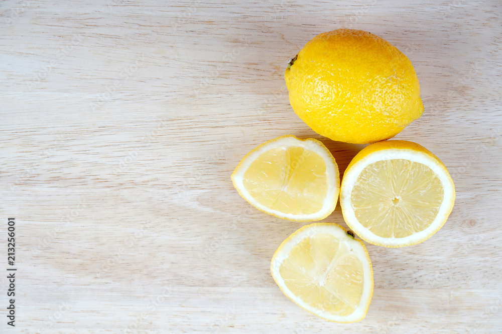 lemon slices over wooden surface lemon slices over wooden surface