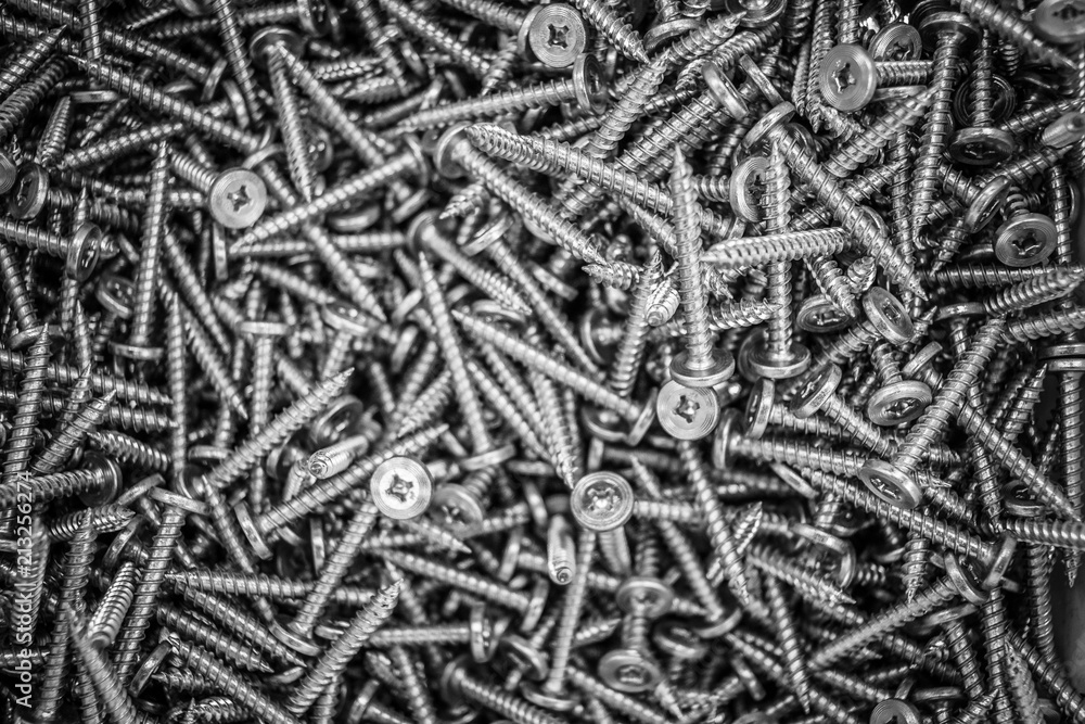 Pile of Screws in Bucket in Workshop Pile of Screws in Bucket in Workshop