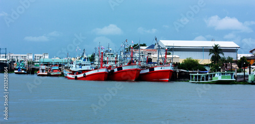 Three fishing vessels In the docks
