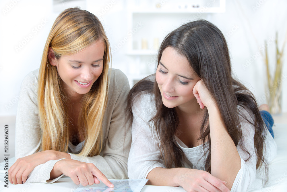 two teenagers girls preparing for school at home two teenagers girls preparing for school at home