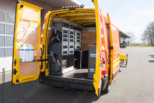Rear view of mobile van workshop with doors open