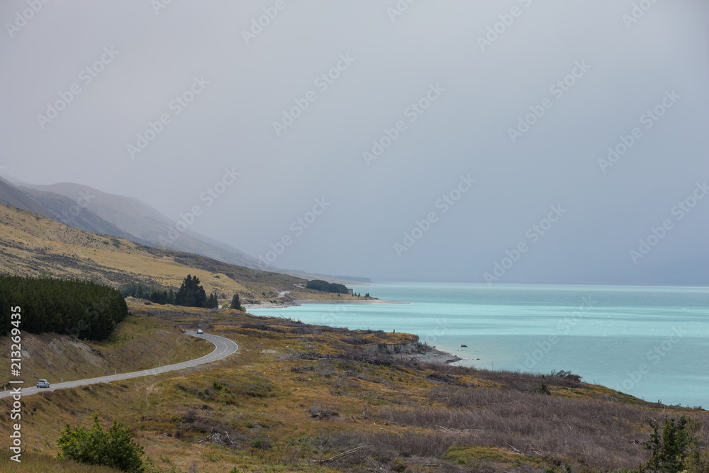 The road next to Lake Pukaki with it's beautiful turquoise waters, south island, New Zealand The road next to Lake Pukaki with it's beautiful turquoise waters, south island, New Zealand