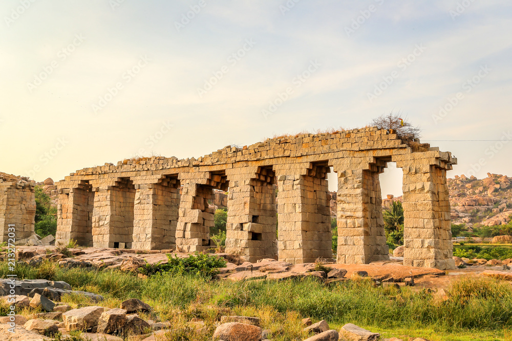 Architecture of ancient ruins of temple in Hampi, India.