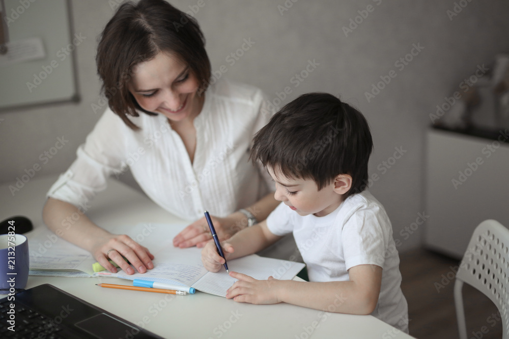 beautiful woman tutor study with child at home beautiful woman tutor study with child at home