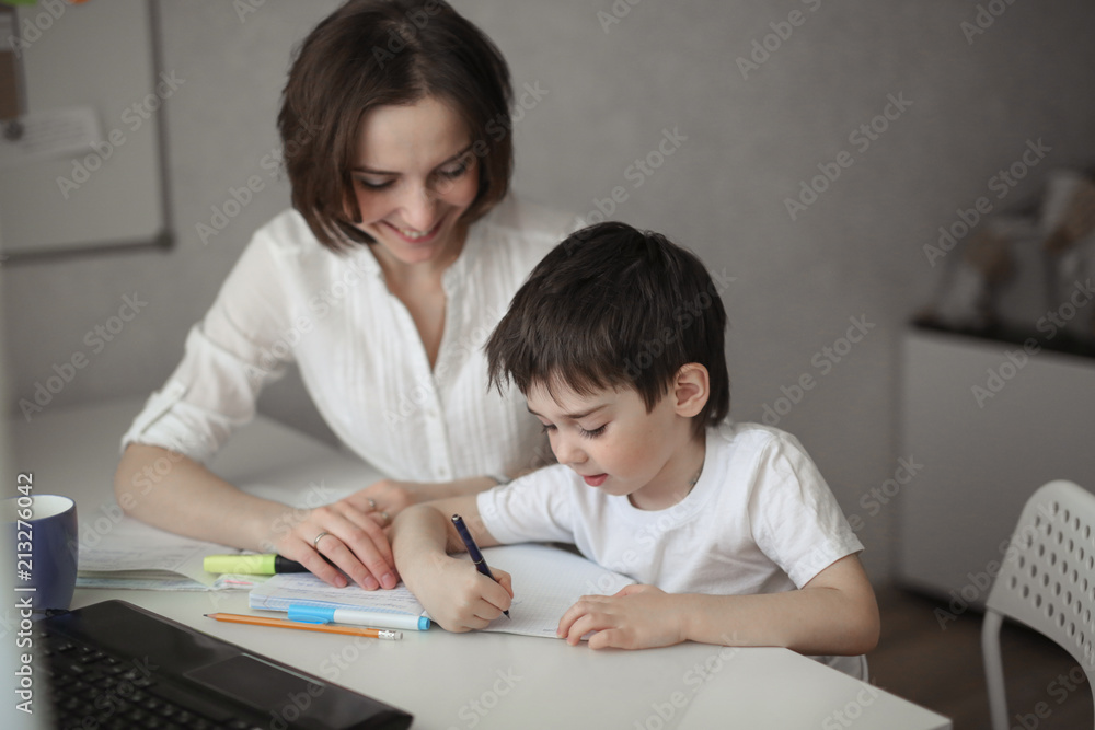 beautiful woman tutor study with child at home beautiful woman tutor study with child at home
