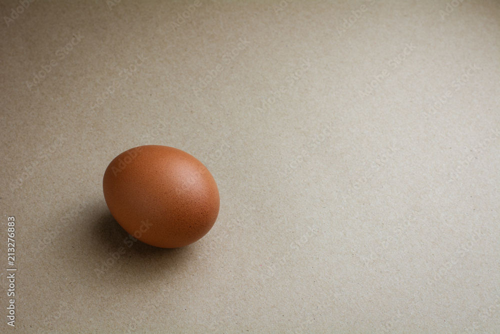 Brown chicken eggs on recycled craft paper Brown chicken eggs on recycled craft paper