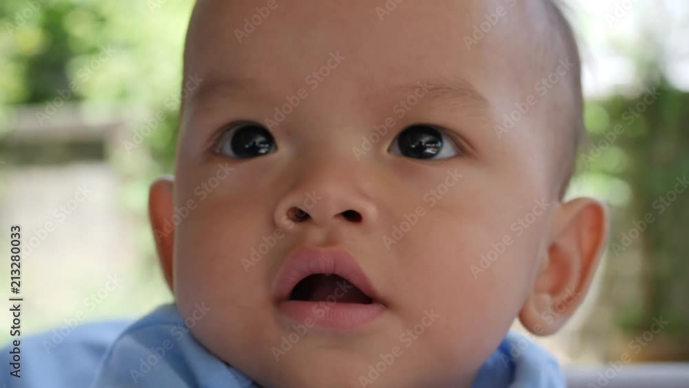 Slow motion Baby laying on bed and laughing happy time Slow motion Baby laying on bed and laughing happy time