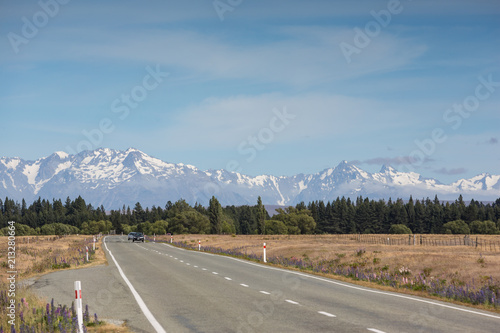 Traffic on the Fairlie Tekapo road near lake Tekapo, south island New Zealand photo