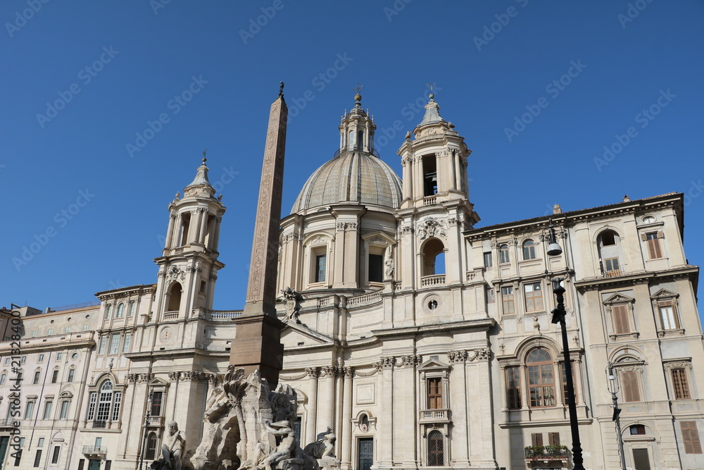 Church and Fontana dei Quattro Fiumi at Piazza Navona in Rome, Italy 