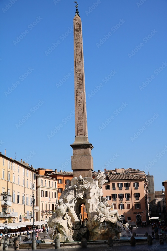 Obelisco Agonale and Fountain of the Four Rivers at Piazza Navona in Rome, Italy 
