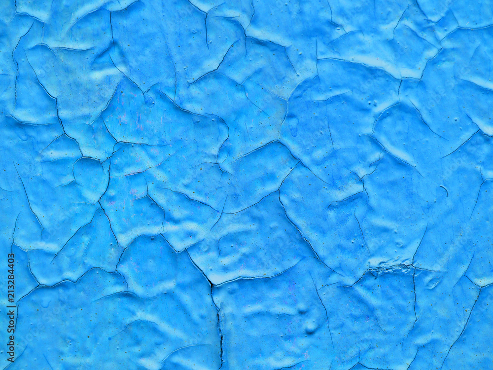 Texture of old cracked blue paint, craquelure