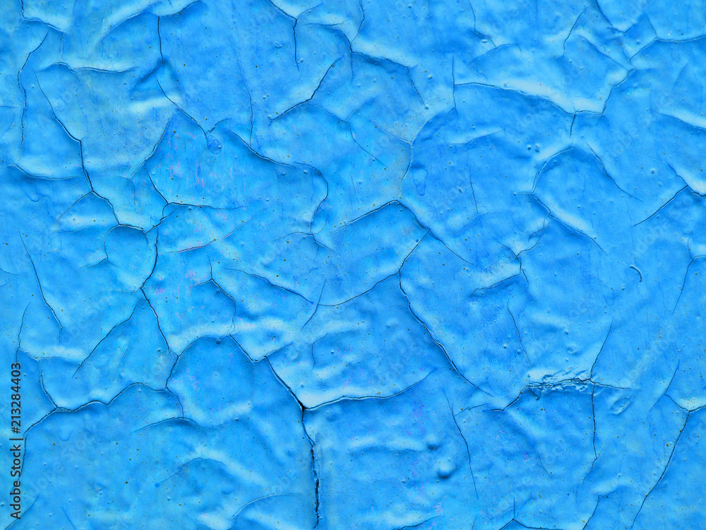 Fototapeta premium Texture of old cracked blue paint, craquelure