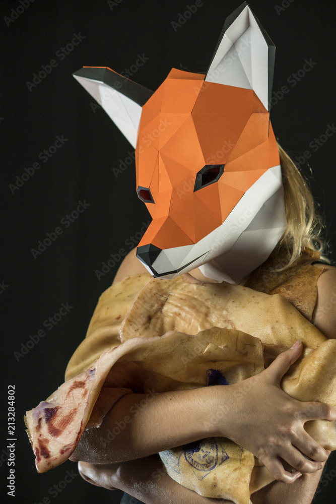Blonde Girl with Fox Mask paper Using Pig Skin for Covering. Dead Animal Consumer Stock Photo | Adobe Stock Blonde Girl with Fox Mask paper Using Pig Skin for Covering. Dead Animal Consumer Stock Photo | Adobe Stock